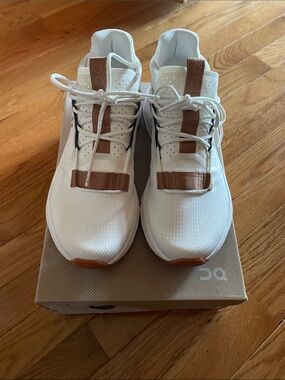 On Running White Sneakers with Tan Accents
